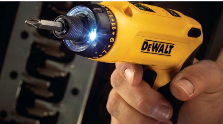 A picture showing a person using DEWALT 8V MAX Cordless Screwdriver Kit, one of the best cordless screwdriver models in a low lit area.
