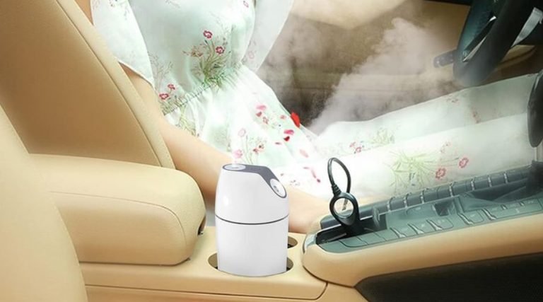 An image showing HandFun Mini Humidifier-Battery Operated 480ml Cordless Portable Small Humidifier , one of the best cordless cordless humidifier in use in a car