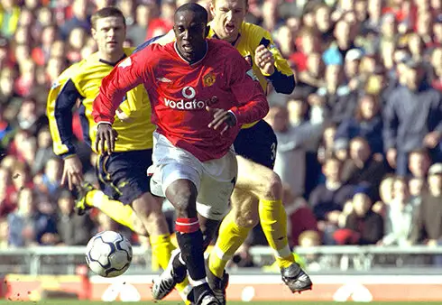 Dwight Yorke against Arsenal/Getty images