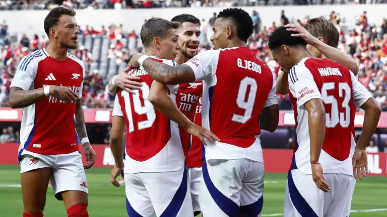 Arsenal players celebrating a goal in pre-season/Getty Images